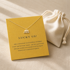 Lucky Us Elephant Necklace — editorial flatlay [autogen-pdp]