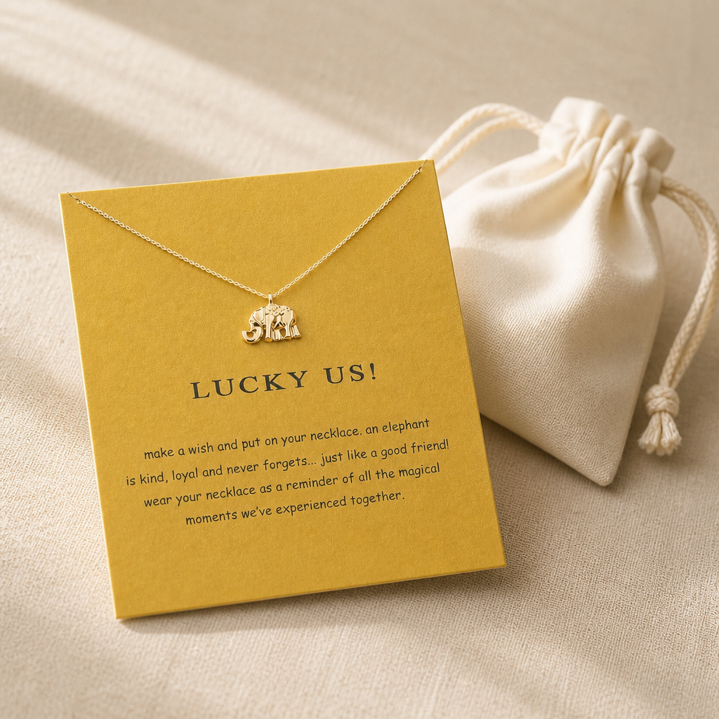 Lucky Us Elephant Necklace — editorial flatlay [autogen-pdp]