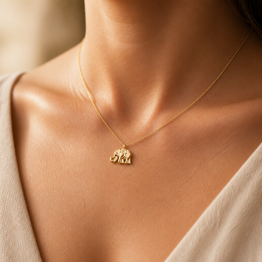 Lucky Us Elephant Necklace — on figure scale [autogen-pdp]