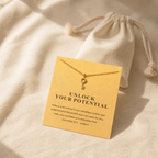 Unlock Your Potential Key Necklace — editorial flatlay [autogen-pdp]
