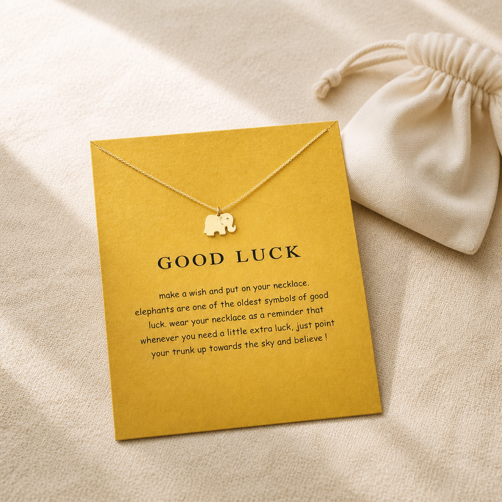 Good Luck Elephant Necklace — editorial flatlay [autogen-pdp]