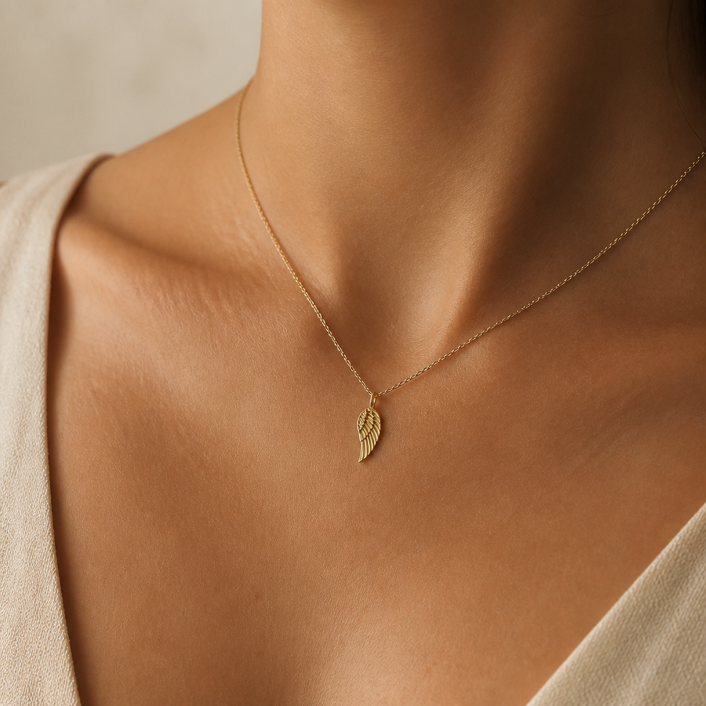 Lift Me Up Angel Wing Necklace — on figure scale [autogen-pdp]