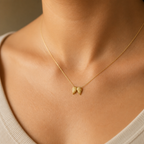 Never Alone Wings Necklace — on figure scale [autogen-pdp]